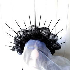 This wonderful Black gothic halo crown will make you the center of a festival or Halloween party. The height of the spikeds Spider goth headpiece is about 7 inches (17.5 cm).  Crown spikes vampire cosplay headband are made of wood. Spikes are securely creased to the headband with felt. The Vampire cosplay headband is decorated with rhinestone chain and acrilic spider. Each part is securely fastened with felt. ATTENTION! The ends of thorns are sharp! Be careful with the people around you while using this crown. The store is not responsible for accidents. More of my burning man headpiece you can see here https://www.etsy.com/ru/shop/byIraFomina?ref=hdr_shop_menu&section_id=28075148 Address to me on any question. I will be happy to help you. Gothic Costume Hat With Round Crown For Costume Party, Gothic High Crown Costume Accessories For Costume Party, Fantasy High Crown Costume Accessories For Halloween, Fantasy High Crown Halloween Costume Accessories, Fantasy High Crown Costume Hats For Cosplay, Fantasy Costume Accessories With Tall Crown For Cosplay, Fantasy Tall Crown Costume Accessories For Cosplay, Halloween Cosplay Costume Accessories With Tall Crown, Gothic Tall Crown For Costume