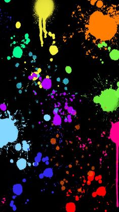 colorful paint splattered on a black background