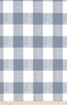 a blue and white checkered fabric with a ruler