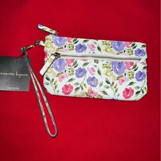 Pocket With Logo Stamp, Top Main Zippered Compartment And A Smaller Interior Zippered Pocket With Logo Patch Making This The Perfect Grab-And-Go Choice. Inside Pockets And Zipper. Looks Delicate. Wristlet. Item Color: White/Pink / Green/ Multicolor Height: 4.75in Width: 8in Depth: 1in Leather Wristlet Zipper Closure Gold Metal Zipper Pull Brand New // Never Worn // New Spring Gift Wristlet With Wrist Strap, Elegant Spring Wristlet For Everyday, Rectangular Wristlet For Spring Gift, Rectangular Wristlet As Spring Gift, Rectangular Wristlet Gift For Spring, Casual Wristlet With Wrist Strap, Spring Clutch With Zipper Closure, White Wristlet For Daily Use In Spring, Spring Wristlet With Wrist Strap For Everyday Use