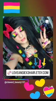 a girl with long black hair and colorful makeup is holding up her peace sign in front of the camera