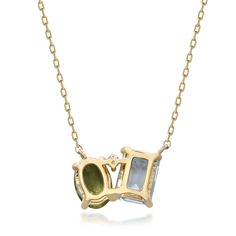 This multi-genstone necklace makes a stylish statement with luminous gemstones in an alluring layout. Crafted in glistening 10K yellow gold, this lovely necklace features one oval peridot, one emerald cut blue topaz and one brilliant cut diamond artistically set in a modern design. | Toi et Moi Multi-Gemstone Necklace | 10K Yellow Gold | Size 18" | Helzberg Diamonds 14k Yellow Gold Necklace With Gemstone Accents, May Birthstone Multi-stone Pendant Necklace, Yellow Gold Multi-stone Necklace For May Birthstone, 14k Gold Necklace With Gemstone Accents For Anniversary, 14k Gold Necklaces With Gemstone Accents For Anniversary, Gold Multi-stone Necklace For May Birthstone, Elegant Gold Multi-stone Birthstone Necklace, Multi Gemstone Necklace, Helzberg Diamonds