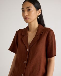 Say hi to relaxed, laidback luxe. Throw on this collared short sleeve with anything to level up a day-to-day fit. The boxy cut will pair with our linen shorts or pants to create your dream resort-life look. Our linen is made from 100% European flax, which is more sustainable and less resource-intensive to grow. Linen is the ultimate year-round fabric because it's breathable and naturally heat-regulating.  | Quince | Women's 100% European Linen Short Sleeve Shirt in Chocolate, Size XS Summer Shirt With Lapel Collar For Everyday, Everyday Summer Shirt With Lapel Collar, Brown Linen Tops With Button Closure, Brown Linen Top With Button Closure, Brown Linen Collared Shirt, Brown Collared Linen Shirt, Classic Linen Shirt With Johnny Collar, Summer Linen Collared Shirt, Summer Linen Shirt With Collared Neckline