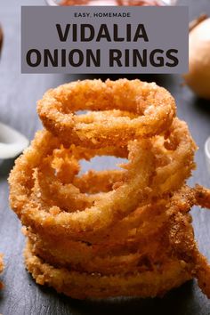 onion rings stacked on top of each other with text overlay reading easy homemade vidali onion rings