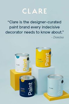 three cans of paint sitting on top of each other next to a box with the words, dare is the designer - curated paint brand every indecive decorator needs to know about