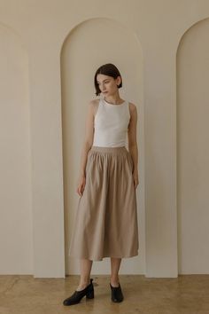 The Maya Skirt – Mod Ref | Common Market Khaki Midi Skirt Outfits, Midi Skirt Outfits, Khaki Midi Skirt, A Line Midi Skirt, Midi Skirt Outfit, White Skirts, Full Skirt, Skirt Outfits, Neutral Colors