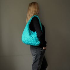 "Green mint hobo bag quilted nylon.  Height:30 cm  ( 11,81 \" ) Width:40 cm  ( 15,74 \" ) Depth:13 cm    ( 5,11 \" ) Handle:  54 cm  ( 21,25 \" ) This hobo bag is made of green mint quilted nylon fabric. Green mint hobo bag has cotton lining, 1 pocket inside, fastens with magnetic button. Nylon green shoulder bag fashion for woman. Light green hobo bag quilted unisex. Light green handbag fashion for women. Mint green shoulder bag puffer for women. City style hobo bag green mint color. Unique green hobo bag handmade. Medium size hobo bag for woman. Green pouch quilted nylon street style. Minimalist green hobo bag. Green purse hobo bag medium size." Everyday Quilted Hobo Shoulder Bag, Quilted Hobo Tote Bag, Quilted Hobo Bag Tote For Everyday, Everyday Quilted Hobo Tote Bag, Casual Quilted Hobo Bag For Everyday, Casual Quilted Hobo Bag, Green Nylon Shoulder Bag For Shopping, Green Quilted Bag For Travel, Green Quilted Shoulder Bag For Travel