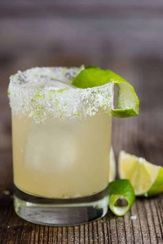 a margarita cocktail with lime and sugar on the rim