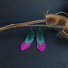 Colorful shining long seed beaded earrings, boho beaded earrings, shoulder dusters ⚜️ Сompletely handmadе ⚜️ Combination of 4 colors - emerald, turquoise, shining pink, bright pink ⚜️ Material - Czech Beads ⚜️ Style - Pierced ⚜️ Length -11 cm ⚜️ Weight for both - 10 g Pink Artisan Beaded Jewelry, Pink Bohemian Beaded Earrings, Bohemian Pink Beaded Earrings With Tiny Beads, Green Beaded Bohemian Chandelier Earrings, Bohemian Green Beaded Chandelier Earrings, Unique Colorful Bead Drop Earrings, Unique Colorful Beads Drop Earrings, Handmade Turquoise Chandelier Earrings With Round Beads, Artisan Jewelry With Beaded Fringe For Crafting