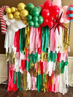 a bunch of balloons and streamers on a table