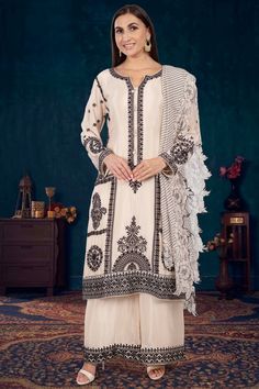 Indulge in the unparalleled elegance of our Partywear Suit D-235. This unique suit features exquisite thread embroidery that adds a touch of luxury and sophistication. Elevate your style and make a statement at any special occasion with this one-of-a-kind suit.