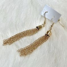 These Fashion Earrings Are Faux Gold And Feature Grouped, Dangly Chain-Links. They Are Very Modern And Fun. These Are Brand New. Size: Hangs 3" Bundle And Save! Chain Tassel Earrings, Gold Metal Tassel Earrings For Party, Gold Chain Metal Earrings For Party, Party Earrings With Gold Chain Detail, Party Earrings With Gold Chain, Gold Chain Earrings For Parties, Adjustable Chain Party Earrings, Gold Chain Drop Earrings For Party, Gold Earrings With Adjustable Chain For Party