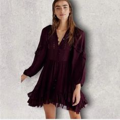 Timeless And Forever Femme, This Stunning Mini Dress Features A Ruffled, Tiered Silhouette With Lace Piecing And Front Hook-And-Eye Closure For A Truly Ethereal Must-Have. Burgundy V-neck Dresses For Brunch, Burgundy Ruffled Dress For Date Night, Long Sleeve Burgundy Dress For Date Night, Burgundy Long Sleeve Dress For Date Night, Mini Length Boho Dress With Ruffles, Burgundy V-neck Dress With Ruffles, Burgundy Long Sleeve Dress For Summer, Spring Burgundy Dresses With Ruffles, Bohemian Fall Dress For Date Night