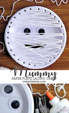 a paper plate that looks like a face with yarn on it and some crafting supplies next to it