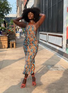 Shop Troy Massa: Nile Dress As seen on Sonia Barbie [] & Dunnie O. dunnieo?igshid=YmMyMTA2M2Y=] ----- Product Details Ankara Print new take on a backless body on sun dress with adjustable back ties. Dry clean only. All items are made-to-order. ----- Ship within 4 weeks No returns. No exchanges. (Due to items being made-to-order.) PLEASE BE ADVISED THAT ANKARA PRINT IN IMAGE MAYBE SOLD OUT.  *UPON ORDERING WE WILL PROVIDE YOU OTHER PRINTS TO CHOOSE FROM. Additional Questions? Please email... Fitted Orange Maxi Dress For Dress Down Occasions, Printed Fitted Maxi Sundress, Fitted Printed Midi Dress With Halter Neck, Fitted Multicolor Midi Sundress, Fitted Multicolor Printed Halter Dress, Fitted Multicolor Maxi Dress For Day Out, Orange Fitted Midi Sundress, Fitted Multicolor Sundress Midi Dress, Sonia Barbie