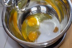 an image of eggs being cooked in a bowl