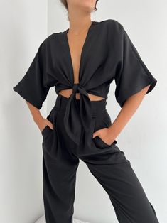 The Bobbie Tie Top is made of luxurious and soft Tencel modal and features a flattering and unique dolman sleeve that drapes beautifully with the body. Intended to be worn with high-waisted trousers, such as the Townes Trousers in Vintage Wash Tencel or the Lena Pants in French Twill . A timeless and unique garment to pair for seasons to come! Made in USA Tie Top, High Waisted Trousers, Dolman Sleeve, Wrap Dress, Trousers, High Waisted, Sweatshirts Hoodie, Sweatshirts, Pants