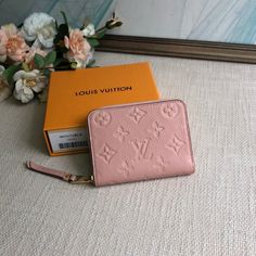 Pink exclusive real shot! A classic Zippy coin purse in refined, supple Monogram Empreinte leather. Generous capacity and delicate gold fittings exude understated elegance. 

Size: 11×8.5×2cm Gold Wallets With Original Box For Gift, Luxury Compact Wallet With Coin Pocket, Luxury Compact Wallets As Gifts, Luxury Compact Wallet As Gift, Luxury Gold Coin Purse With Card Slots, Elegant Compact Wallets, Elegant Gold Wallet With Coin Pocket, Classic Pink Compact Wallet, Classic Compact Pink Wallet