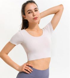 The EMES SHOP shirt details a low scoop backwithshortsleeves and a body hugging fit. Designed with crossing straps in the back. this classic. simple. and comfortable top will transform the way you perceive active wear.MATERIAL:78% Nylon 22% SpandexMEASUREMENTS:X-Small : 0-2 Waist: 23.5-25 in Chest: 31.5-33 inSmall : 4-6 Waist: 25-26.5 in Chest: 33-34.5 inMedium : 6-8 Waist: 26.5-28 in Chest: 34.5-36 inLarge : 8-10 Waist: 28-29.5 in Chest: 36-37.5 in Eatonton Georgia, Active Top, Comfortable Tops, Cross Straps, Dark Gray, Shirt Shop, Pink White, Unique Style, The Way