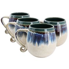 three coffee mugs with handles on each one