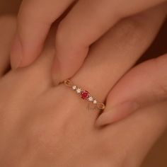 Dainty Ruby Gold Ring, July Birthstone Rings, Ruby Diamond Ring, Red Ruby Stacking Ring, Genuine Ruby Rings, Graduation Ring, Casual Rings We use the highest quality moissanite! Moissanite: ✦ Color: D Colorless ✦ Clarity: VVS1 OR All our diamonds are 100% natural. We use only conflict-free diamonds and gemstones. Diamond: ✦ Color: F-G ✦ Clarity: SI1-VS ✦PRODUCT DETAILS✦ → center stone: natural ruby → accent stone: diamonds Also available in other colored gemstones upon request. Please get in tou Red Birthstone Ring With Round Band, Red Oval Stackable Promise Rings, Red Birthstone Stackable Rings Fine Jewelry, Luxury Ruby Rings In Dainty Style, Ruby Dainty Ring, Red Round Band Stackable Rings As Gift, Red Stackable Round Band Rings For Gift, Red Stackable Round Band Rings As Gift, Red Stackable Rings As A Gift