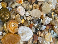 many different colored rocks and gravel together