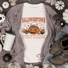 Get into the Halloween spirit with our Spooktacular Halloween T-Shirt! This festive tee is a perfect blend of eerie and enchanting, capturing the essence of Halloween with its playful and spooky designs. Whether you're gearing up for a haunted house, a costume party, or a night of trick-or-treating, this shirt is your go-to for celebrating all things Halloween. Embrace the magic, mystery, and fun of the season with this must-have tee! Product features - Made with 100% Airlume combed and ring-spun cotton, lightweight and breathable - Retail fit for casual and semi-formal settings - Manufactured by Bella+Canvas in a sustainable and humane way - Ribbed knit collar with seam that retains its shape - Tear-away label for skin irritations Care instructions - Machine wash: cold (max 30C or 90F) - Funny White T-shirt For Fall, White Horror T-shirt For Fall, Spooky Pre-shrunk T-shirt For Fall, Spooky Fall T-shirt Pre-shrunk, Funny Print Novelty T-shirt For Fall, Novelty T-shirt With Funny Print For Fall, Cotton Horror T-shirt For Fall, Affordable Casual Halloween T-shirt, Fall Novelty T-shirt With Funny Print