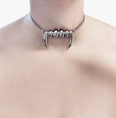 Vampire Bite Choker 🖤 This choker is the perfect way to add a touch of darkness to your look. The rhodium plated chain is durable and tarnish-resistant, while the large silver vampire teeth charm is a statement piece that will turn heads. 🖤 Only one available as I like to make one of a kind pieces so that you have a unique, standout, rare, special piece that you can't find anywhere else. Keep your jewellery away from water, oils, perfumes and make sure to remove before showering and sleeping i Silver Vampire Style Necklace, Alternative Halloween Jewelry With Adjustable Chain, Alternative Halloween Jewelry With Chain, Silver Vampire Choker For Halloween, Alternative Halloween Chain Jewelry, Punk Halloween Chain Jewelry, Edgy Clavicle Chain Jewelry For Halloween, Punk Style Halloween Chain Jewelry, Halloween Silver Claw Jewelry