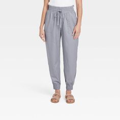 Women's High-rise Woven Ankle Jogger Pants - A New Day™ : Target Spring Leisure Joggers With Tapered Leg, Spring Tapered Leg Leisure Joggers, Comfortable Spring Joggers With Tapered Leg, Comfortable Spring Tapered Leg Joggers, Comfortable Spring Joggers With Pockets, Spring Leisure Ankle-length Joggers, Spring Athleisure Capris With Elastic Waistband, Spring Everyday Joggers, Leisure Spring Pants With Pull-on Style