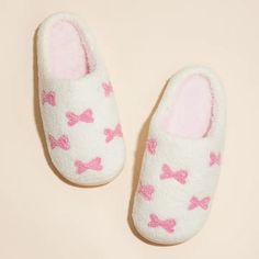 Put your best (and cosiest) foot forward with our Little Pink Ribbons Home Slippers! These playful and quirky slippers feature adorable pink ribbons that will add a touch of fun to your at-home lounging. Made with comfort in mind, these slippers are the perfect addition to your self-care routine. Small: Womens size 6-7 Medium: Womens size 8-9 Large: Womens Size 10-11 Home Slippers, Makeup Case, House Slippers, Self Care Routine, Mens Swimwear, Pink Ribbon, Care Routine, Cowhide Leather, Womens Swim