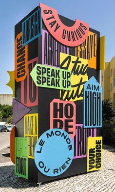 a colorful sign on the side of a building