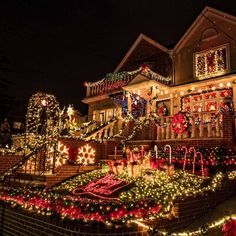 a house covered in christmas lights and decorations