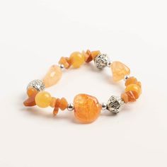 Buy the John Bead Crystal Orange-Dyed Citrine Natural Stone Bracelet at Michaels. com. Crystals are sometimes believed to have health benefits and these stones in particular are associated with energy, clear thinking, psychic ability, spiritual development and immune system performance. This cute accessory features orange-dyed citrine, natural stone beads and silver-tone spacer beads. Crystals are sometimes believed to have health benefits and these stones in particular are associated with energ Psychic Ability, Clear Thinking, Natural Stone Beads, Natural Stone Bracelets, Spiritual Development, Psychic Abilities, Gemstone Bracelet, Stone Bracelet, Spacer Beads