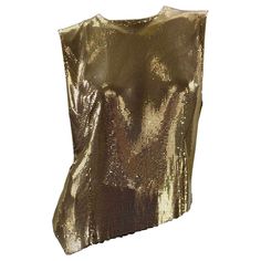 F/W 1994 Gianni Versace Couture Gold Metal Mesh Oroton Top Size: Italian - 40, US - 4 Zipper on the back, Fully lined. Measurements: length - 18 inches ( highest part ), 22" ( lower part ), bust - up to 36", waist - 32". Made in Italy Excellent condition. Luxury Summer Evening Tops, Luxury Evening Tops For Summer, Luxury Tops For Summer Night Out, Designer Fitted Gold Top, Gold Fitted Luxury Top, Luxury Fitted Gold Top, Luxury Gold Top For Evening, Luxury Gold Tops For Evening, Designer Sleeveless Party Tops