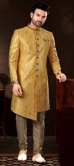 Gold color Sherwani in Jacquard fabric with Thread, Weaving, Zari work Elegant Eid Sherwani With Zari Weaving, Ceremonial Sherwani With Zari Weaving, Formal Sherwani With Zari Weaving In Traditional Drape, Formal Sherwani With Zari Weaving, Traditional Bandhgala With Zari Weaving For Formal Occasions, Formal Bandhgala With Zari Weaving For Eid, Elegant Sherwani With Zari Weaving For Formal Events, Formal Bandhgala With Zari Weaving For Diwali, Elegant Wedding Bandhgala With Zari Weaving