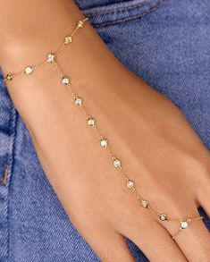 This Diamond Bezel Hand Chain Bracelet is a sparkly way to get your hands on some shine - it's the perfect basic to start your stack party! Nobody can resist a diamond bezel! Details:14k Gold - Available in Yellow, Rose and White GoldAverage diamond weight is 0.46ctLink dimensions: 1mmBezel diameter: 4mmDistance between bezels: 7mmBracelet length is customizable, we recommend 6"-7" Shipping & Returns:Orders can be cancelled only within the first 24 hours.Most of our pieces are made to order, ple Dainty Diamond Bracelet With Sparkling Stones, Adjustable 14k Gold Diamond Bracelet Hand Set, Dainty Adjustable Diamond Chain Bracelet, Fine Jewelry Adjustable Chain Bracelet With Diamond Accents, Adjustable Bezel Set Cubic Zirconia Diamond Bracelet, Gold Diamond Chain Bracelet With Bezel Setting, Hand Set Yellow Gold Diamond Bracelet For Party, Party Yellow Gold Diamond Bracelet Hand Set, Adjustable Diamond Bracelet For Parties