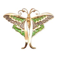 This is part of Chairish’s Costume Jewelry assortment.  Goldtone light and dark green enamel butterfly brooch with security clasp. Marked "Napier." Measures: 2 1/8 inches long by 2 3/4 inches wide. Condition: Very good; perhaps the slightest of surface wear to the goldtone. A blue and green enamel version of this brooch was featured in a c1971 advertisement. I also have a yellow and orange version of this pin as well as one of the other butterflies from the same advertisement.  Please reference Antique Green Brooch For Evening, Formal Green Enamel Brooches, Vintage Butterfly Brooch For Formal Occasions, Green Butterfly Brooch Jewelry, Mid-century Green Brooch For Formal Occasions, Elegant Green Enamel Pin, Mid-century Green Brooches For Formal Occasions, Green Mid-century Style Brooches For Formal Occasions, Mid-century Green Formal Brooches