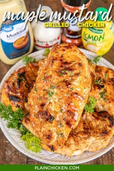 grilled chicken on a plate with mayonnaise and mustard in the background