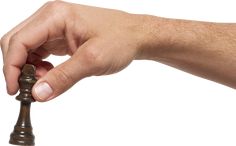 a hand holding a small metal object in it's right hand, on a white background