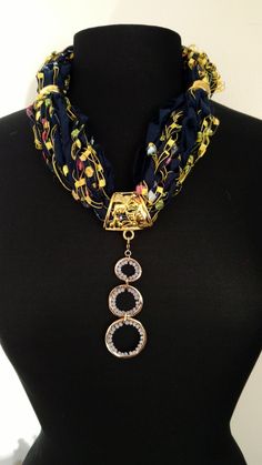 This ribbon scarf/necklace is made with a variety of specialty ribbons and yarns from around the world. Done in shades of blue and yellow    This ribbon scarf necklace come with gold jewelry and an interchangeable pendant.  This is a ResQ™ product so 10% of the profits go to help the fight against human trafficking.  FREE SHIPPING Scarf Necklace Diy, Adjustable Ribbon Necklace For Gifts, Fabric Jewelry Handmade, Ribbon Necklace With Pendant, Scarf Necklace Necklush, Ribbon Scarf, Necklace Scarf, Beaded Scarf, Scarf Ideas