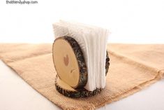 a piece of wood that is sitting on top of a cloth