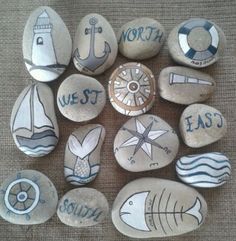 some rocks with different designs and words on them