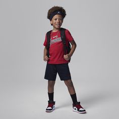 Smaller ballers can represent the Brand of Flight in this matching 2-piece set. The soft jersey knit graphic tee has a regular fit and feels gentle on skin and the matching breathable mesh shorts have a stretch waistband for a comfy fit kiddos can play freely in. Summer Athleisure T-shirt For Playwear, Casual Graphic Print Shorts For Playwear, Cotton Athleisure T-shirt For Playwear, Casual Moisture-wicking Short Top, Casual Moisture-wicking Shorts For Playwear, Sporty Graphic Print Shorts For Sports, Casual Athletic Shorts With Graphic Print For Sports, Sporty Graphic Print Athletic Shorts, Casual Moisture-wicking Tops For Playwear