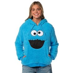 Snuggle up in comfort and character with this Sesame Street Cookie Monster costume hoodie. Crafted from ultra-soft, plush fleece, this hoodie is designed to keep you cozy and warm whether you're lounging at home or out and about. The standout feature is the large, embroidered Big Face design of Cookie Monster, bringing his fun and lovable personality to life. The hoodie is great for fans of all ages and makes an effortless costume option for themed events or Halloween. Get ready to embrace your Toddler Cookie Monster Costume, Cookie Monster Outfit, Cookie Monster Sweater, Cookie Monster Shirt, Cookie Monster Onesie, Cookie Monster Costume, Black Panther Costume, Monster Costume, Monster Hoodie