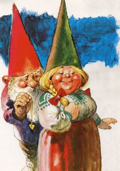 two gnomes are standing next to each other