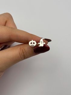 👻 🎃Get into the spooky spirit with our Halloween Spooky Ghost/Pumpkin Earrings! These adorable 925 sterling silver stud earrings feature tiny ghost and pumpkin designs, perfect for adding a festive touch to your fall and Halloween jewelry collection. Whether you're dressing up for a Halloween party or simply looking for a fun, seasonal accessory, these earrings are the perfect choice. Choose your own Spooky Style! You can choose pumpkin and/or ghost. Choose your pair!  Crafted from high-quality sterling silver, they are durable and comfortable for everyday wear. These cute and spooky earrings make an excellent Halloween party gift for friends or a fun treat for yourself. Celebrate the season in style with these charming ghost and pumpkin earrings! 👻🎃 Spooky Hypoallergenic Jewelry For Halloween, Cute Hypoallergenic Halloween Earrings, Spooky Nickel-free Earrings For Halloween, Silver Spooky Halloween Earrings, Halloween Themed Silver Earrings, Silver Themed Earrings For Halloween, Themed Silver Earrings For Halloween, Tiny Ghost, Halloween Party Gifts