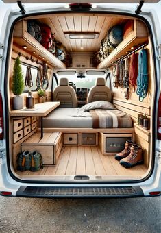 the interior of a van with an open bed and lots of shoes on the floor