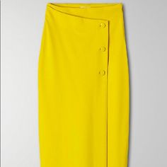 Midi Wrap Skirt With An Asymmetrical Drape And A Functional Three Button Closure At The Front. It’s Made From Smooth, Refined Pints Fabric With Great Shape Retention. Has An Invisible Zipper. Color: Warm Chartreuse. Almost Brand New; Only Worn Once. Tag Detached But Still Available. Spring Asymmetrical Skirt With Buttons, Asymmetrical Button Skirt For Spring, Spring Asymmetrical Buttoned Skirt, Knee-length Skirt With Side Buttons For Spring, Spring Knee-length Skirt With Side Buttons, Summer Workwear Skirt With Side Buttons, Fitted High Waist Skirt With Side Buttons, Yellow Midi Skirt For Work, Fitted Knee-length Skirt With Side Buttons