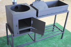 an outdoor grill with two pots and pans on the stove top, sitting on green grass