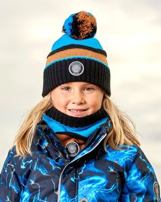 Our Knit Hat Blue, Black and Spice is a must-have on cold weather days. Oh-so-soft in acrylic yarn, this beanie hat features an easy pull-on fit with a cozy lining, a fluffy pompom on top, and a horizontal stripe pattern that makes it easy to mix and match with a variety of different coats and snowsuits. Beanie hat Pompom Logo patch 100% Acrylic - Lining: 94% Polyester, 6% Elastane Fits true to size From 2 years to 14 years Boys Knits, Dress Gift, Brand Collection, Snow Suit, Kids Hats, Mini Boden, Workout Accessories, Knit Hat, Exclusive Bag